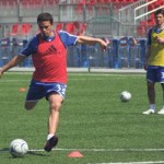 kilian elkinson and laurent robert of TFC in training